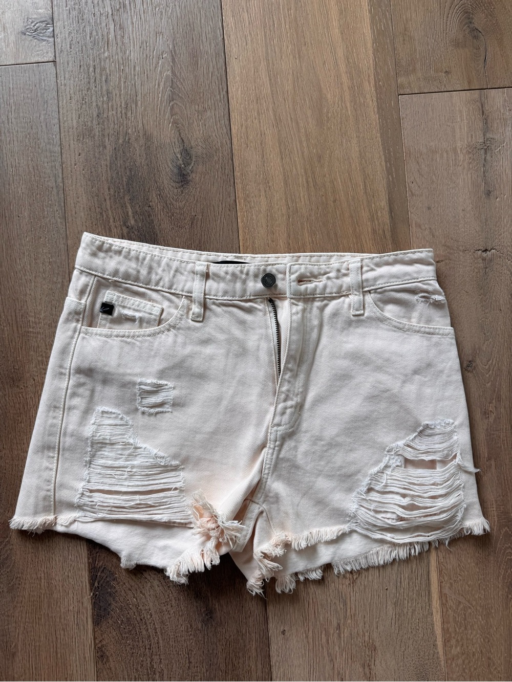 Women's Light Pink Distressed Denim Shorts